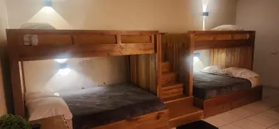 Cama o camas de una habitación en Hotel Bertis