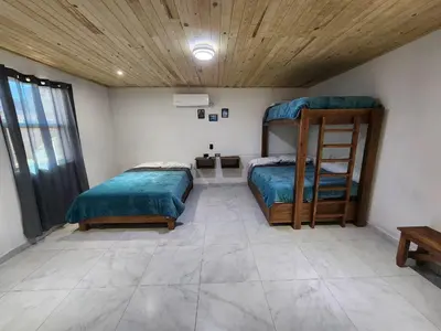 Cama o camas de una habitación en Hotel Bertis 2