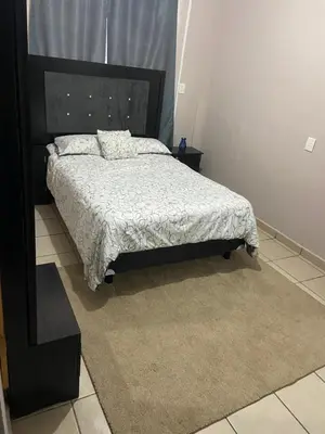 Cama o camas de una habitación en Cómodo ideal para ti cerca de estadio el encanto