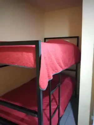 Cama o camas de una habitación en Cuarto independiente doble