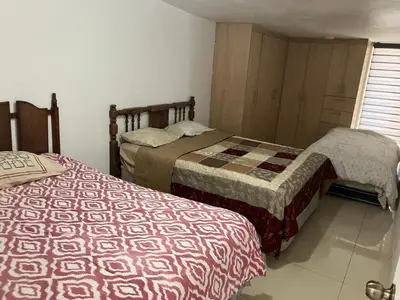 Cama o camas de una habitación en Casa de Huéspedes Encanto Raramuri