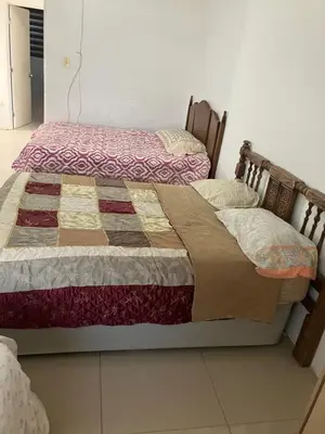 Cama o camas de una habitación en Casa de Huéspedes Encanto Raramuri