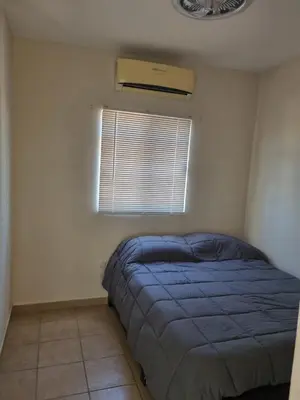 Cama o camas de una habitación en casa lourdes