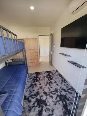 Cama o camas de una habitación en Te Va a Encantar, Torre Turquesa