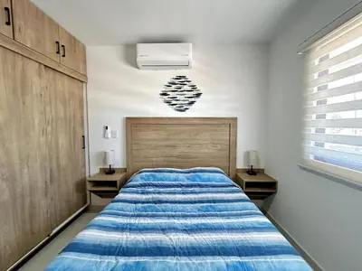 Cama o camas de una habitación en Un Lugar Ideal cerca de la playa by G P S rentas