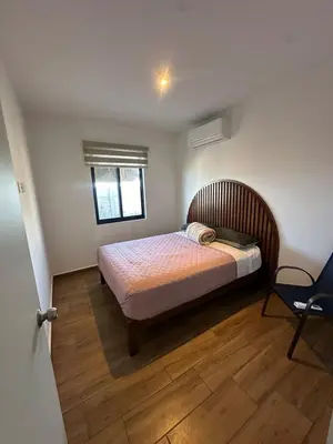 Cama o camas de una habitación en Punta Paraiso Departamento
