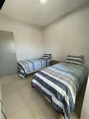 Cama o camas de una habitación en GR20acd Panamericana