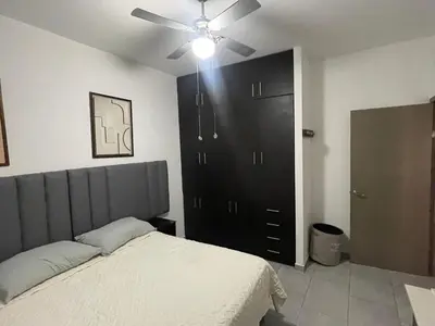 Cama o camas de una habitación en Departamento completo