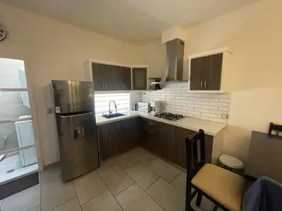 Una cocina o zona de cocina en Departamento completo