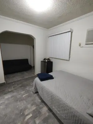 Cama o camas de una habitación en Santafe Suites