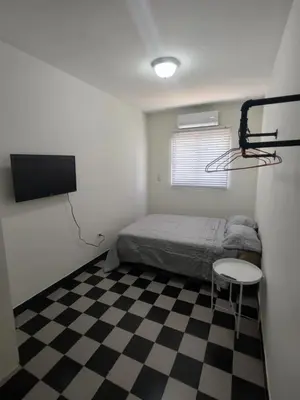 Cama o camas de una habitación en Santafe Suites