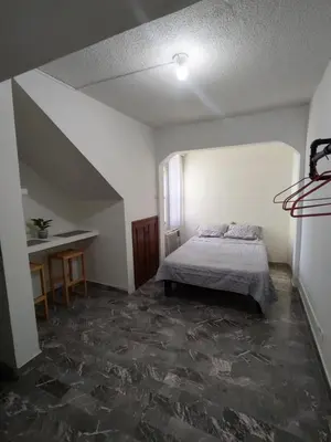 Cama o camas de una habitación en Santafe Suites