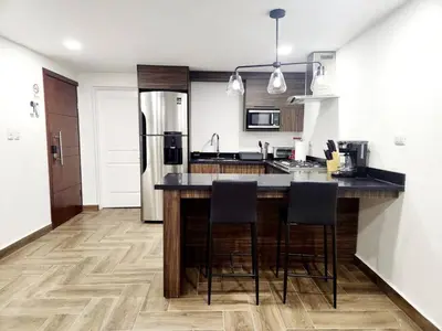 Una cocina o zona de cocina en Elegante Loft Pitagoras 1