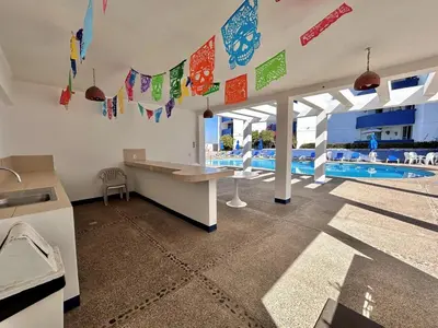 Piscina en o cerca de Acogedor depa a pie de playa by G P S rentas