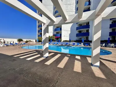 Piscina en o cerca de Acogedor depa a pie de playa by G P S rentas
