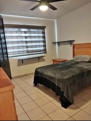 Cama o camas de una habitación en GRANJAS s