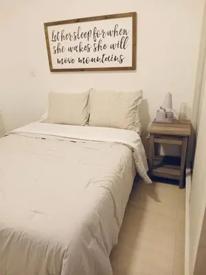 Cama o camas de una habitación en La Casita de Coco