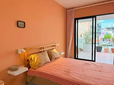 Cama o camas de una habitación en Cozy space near the beach Loft Gutiérrez