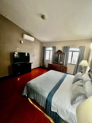 Cama o camas de una habitación en Casa Lomas en Zona Dorada, 5 minutos de la playa