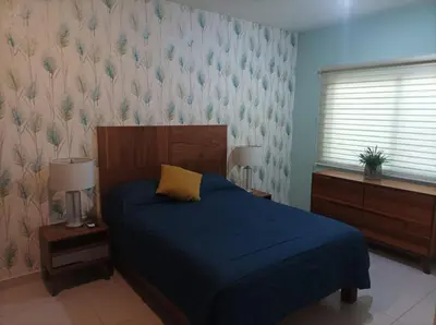 Cama o camas de una habitación en Nice and comfortable apartment, close to the pier