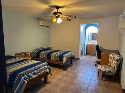 Cama o camas de una habitación en Casa en Huepac