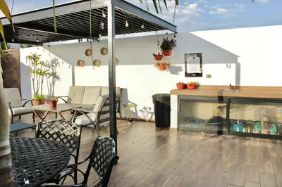 Un balcón o terraza de Apartment in the golden zone near the beach rincon colonial 102