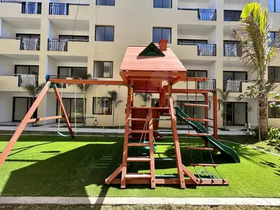 Zona de juegos infantil en Nice apartment near the beach Oceanna 224A