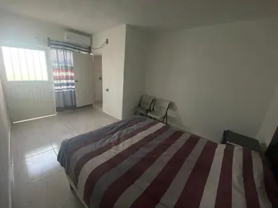 Cama o camas de una habitación en Depto 2 Planta alta, tranquilo