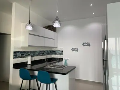 Una cocina o zona de cocina en Torre Eme -Stunning bay view & balcony!