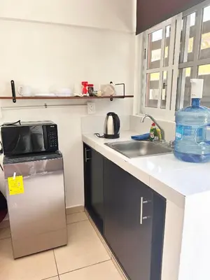 Una cocina o zona de cocina en Habitaciones del centro