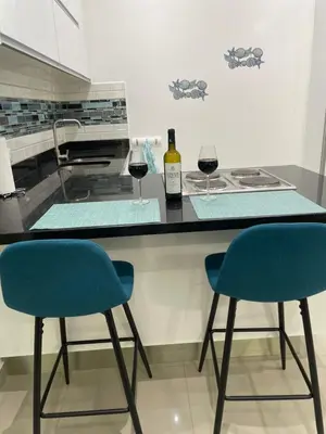Una cocina o zona de cocina en Torre Eme- stunning bay view and balcony!