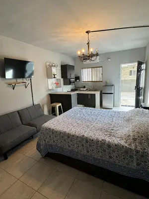 Cama o camas de una habitación en Estancias Nava #4