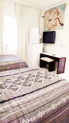 Cama o camas de una habitación en Park Royal Depto de Lujo Frente Playa