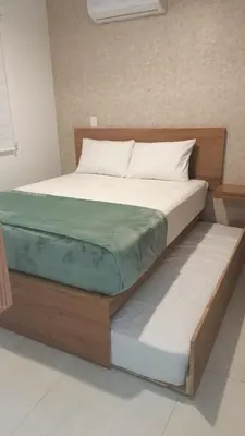 Cama o camas de una habitación en Oceanna Condos de Mar apartamento frente al mar