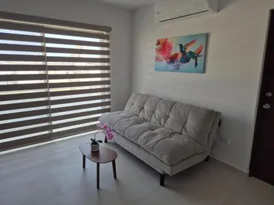 Zona de estar de New Oceanfront Apartment