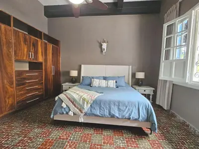 Cama o camas de una habitación en Iconic Centro Retreat Walk to Beach & Dining