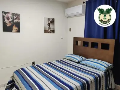 Cama o camas de una habitación en Departamentos Torre D Mazatlán