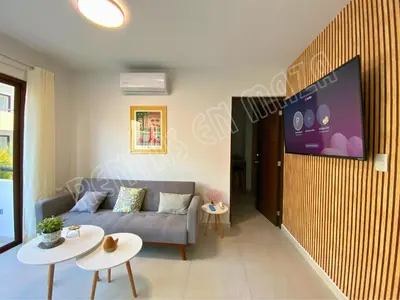 Una televisión o centro de entretenimiento en Condominio Oceanna 4