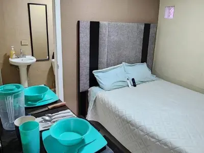 Cama o camas de una habitación en Depa Loved, 15 min Consulado, 2 min Pza Alameda