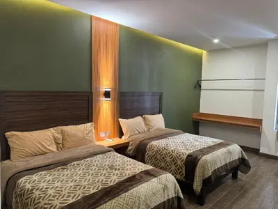 Cama o camas de una habitación en Hotel Los Valles Plus