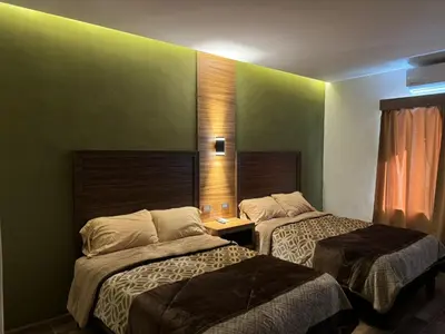 Cama o camas de una habitación en Hotel Los Valles Plus