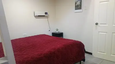 Cama o camas de una habitación en Apartment in Paseos de Chihuahua
