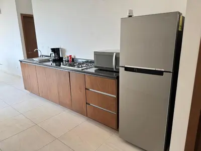 Una cocina o zona de cocina en Departamentos Aremay