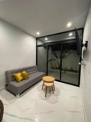 Zona de estar de Departamento familiar