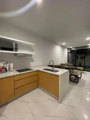 Una cocina o zona de cocina en Departamento familiar