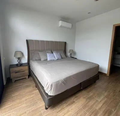 Cama o camas de una habitación en Departamento familiar