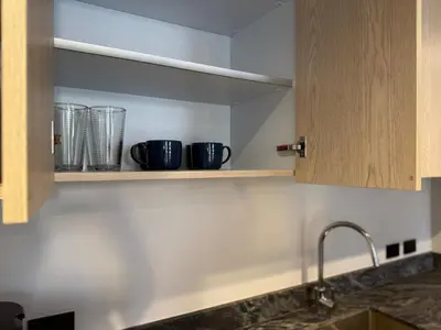 Una cocina o zona de cocina en Modern space in the heart of the historic center