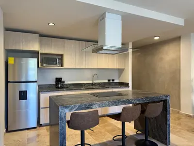 Una cocina o zona de cocina en Modern space in the heart of the historic center
