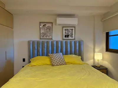 Cama o camas de una habitación en Modern space in the heart of the historic center
