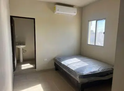 Cama o camas de una habitación en Departamento olivas